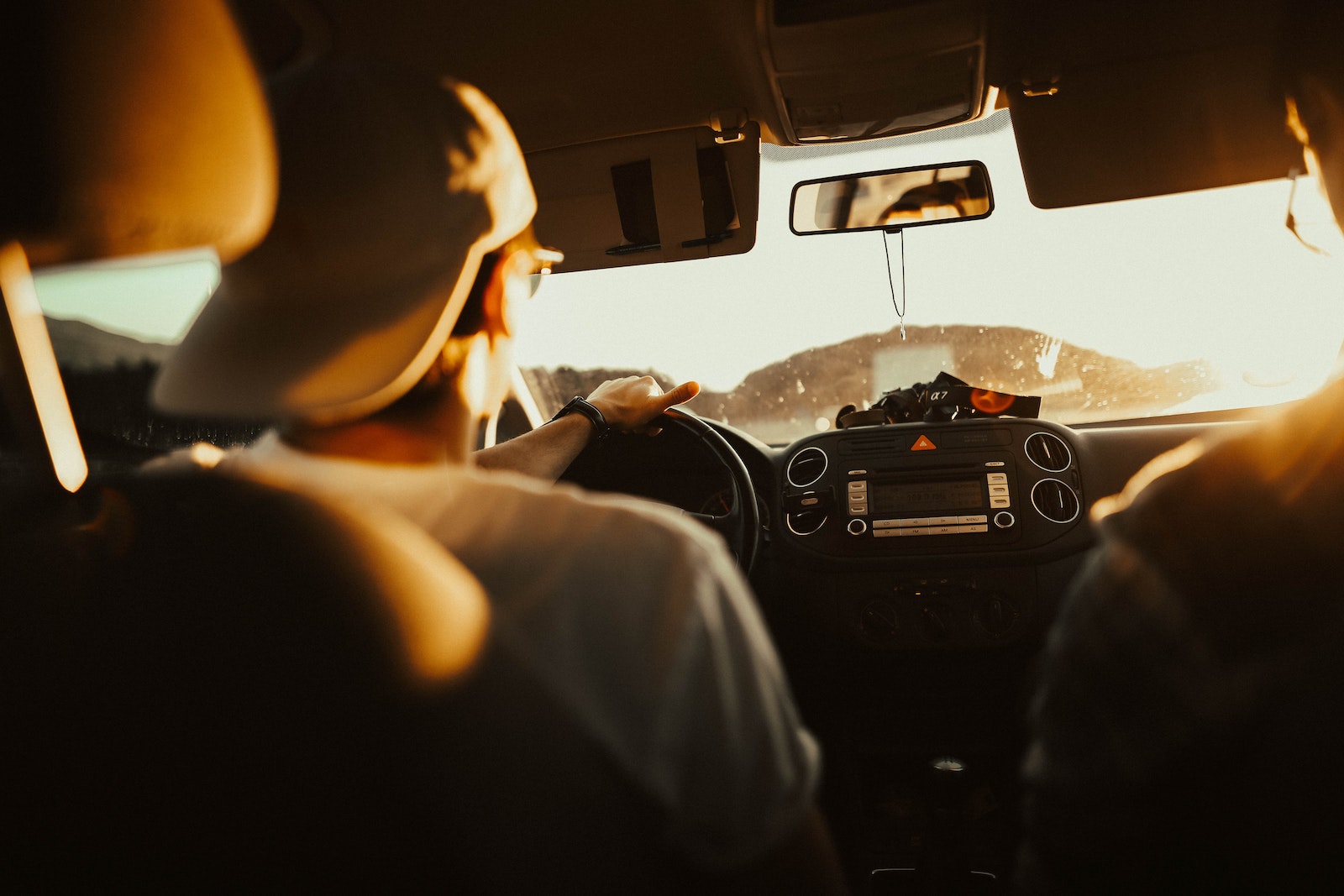 Man Holding the Steering Wheel While Driving Car, Auto insurance